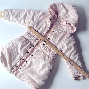 Pre own in good condition. Stains on the sleeves, front. I washed it very well.